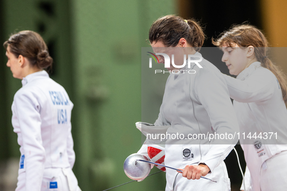 Katharine Holmes of Team United States  reacts after losing a match  during the Women's Epee Team Classifications 5-8, Match 6,  match betwe...