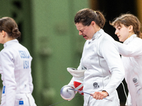 Katharine Holmes of Team United States  reacts after losing a match  during the Women's Epee Team Classifications 5-8, Match 6,  match betwe...