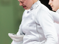 Katharine Holmes of Team United States  reacts after losing a match  during the Women's Epee Team Classifications 5-8, Match 6,  match betwe...