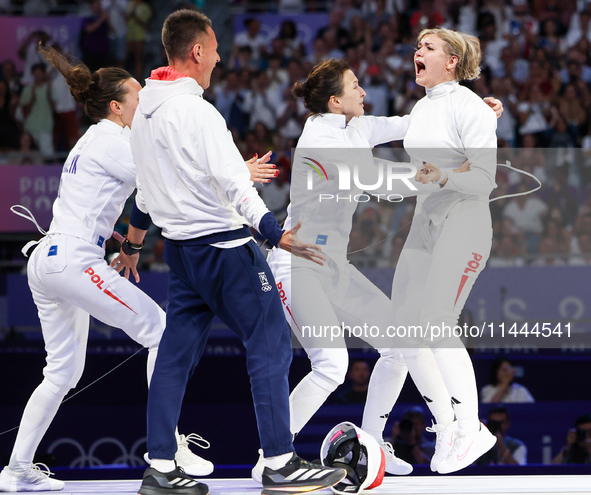 Aleksandra Jarecka, Martyna Swatowska, Wglarczyk, Renata Knapik-Miazga of Team Poland is  celebrate victory after the bronze medal match in...