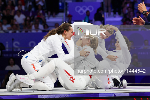 Aleksandra Jarecka, Martyna Swatowska, Wglarczyk, Renata Knapik-Miazga of Team Poland is  celebrate victory after the bronze medal match in...