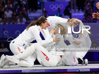 Aleksandra Jarecka, Martyna Swatowska, Wglarczyk, Renata Knapik-Miazga of Team Poland is  celebrate victory after the bronze medal match in...