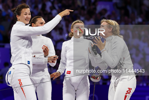 Aleksandra Jarecka, Martyna Swatowska, Wglarczyk, Renata Knapik-Miazga of Team Poland is  celebrate victory after the bronze medal match in...