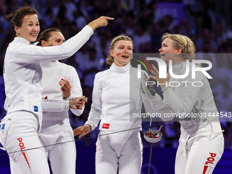 Aleksandra Jarecka, Martyna Swatowska, Wglarczyk, Renata Knapik-Miazga of Team Poland is  celebrate victory after the bronze medal match in...