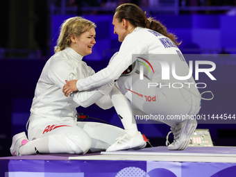 Aleksandra Jarecka, Martyna Swatowska, Wglarczyk,  of Team Poland is  celebrate victory after the bronze medal match in women's 11 rowing be...