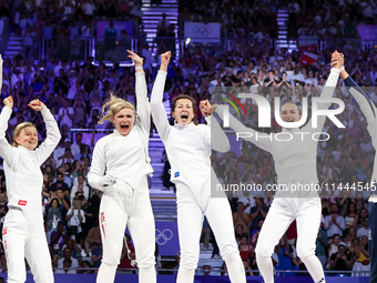 Aleksandra Jarecka, Martyna Swatowska Wglarczyk, Renata Knapik-Miazga, and Aleksandra Klasik  of Team Poland is  celebrate victory after the...