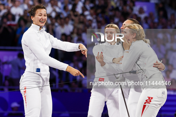 Aleksandra Jarecka, Martyna Swatowska Wglarczyk, Renata Knapik-Miazga, and Aleksandra Klasik  of Team Poland is  celebrate victory after the...