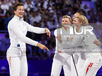 Aleksandra Jarecka, Martyna Swatowska Wglarczyk, Renata Knapik-Miazga, and Aleksandra Klasik  of Team Poland is  celebrate victory after the...