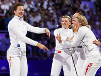 Aleksandra Jarecka, Martyna Swatowska Wglarczyk, Renata Knapik-Miazga, and Aleksandra Klasik  of Team Poland is  celebrate victory after the...