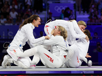 Aleksandra Jarecka, Martyna Swatowska Wglarczyk, Renata Knapik-Miazga, and Aleksandra Klasik  of Team Poland is  celebrate victory after the...