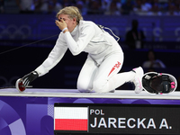 Aleksandra Jarecka,  is  celebrating  victory after the bronze medal match in women's 11 rowing between the Polish national team and the Chi...