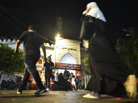 Ambulances are following an Israeli military strike on a building in Beirut's southern suburb, in Beirut, Lebanon, on July 30, 2024. The Isr...