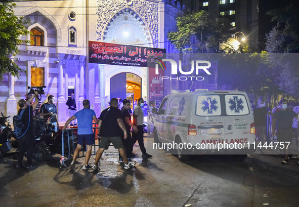 Ambulances are following an Israeli military strike on a building in Beirut's southern suburb, in Beirut, Lebanon, on July 30, 2024. The Isr...