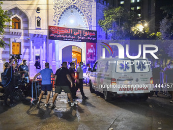 Ambulances are following an Israeli military strike on a building in Beirut's southern suburb, in Beirut, Lebanon, on July 30, 2024. The Isr...