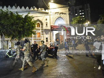 Ambulances are following an Israeli military strike on a building in Beirut's southern suburb, in Beirut, Lebanon, on July 30, 2024. The Isr...