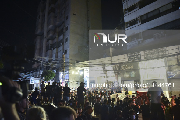 Ambulances are following an Israeli military strike on a building in Beirut's southern suburb, in Beirut, Lebanon, on July 30, 2024. The Isr...