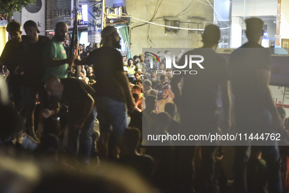 Ambulances are following an Israeli military strike on a building in Beirut's southern suburb, in Beirut, Lebanon, on July 30, 2024. The Isr...