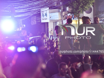 Ambulances are following an Israeli military strike on a building in Beirut's southern suburb, in Beirut, Lebanon, on July 30, 2024. The Isr...