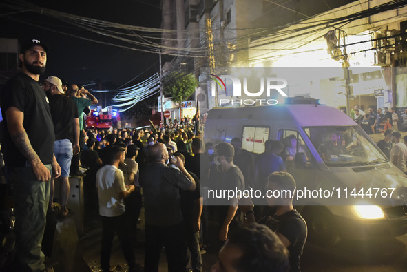 Ambulances are following an Israeli military strike on a building in Beirut's southern suburb, in Beirut, Lebanon, on July 30, 2024. The Isr...