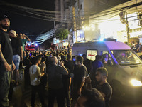 Ambulances are following an Israeli military strike on a building in Beirut's southern suburb, in Beirut, Lebanon, on July 30, 2024. The Isr...