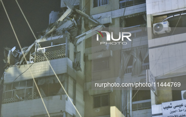 Ambulances are following an Israeli military strike on a building in Beirut's southern suburb, in Beirut, Lebanon, on July 30, 2024. The Isr...