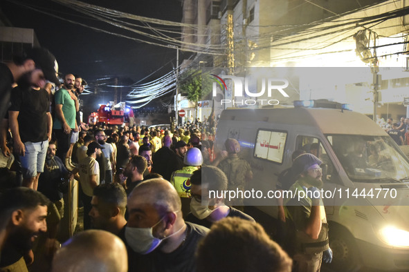 Ambulances are following an Israeli military strike on a building in Beirut's southern suburb, in Beirut, Lebanon, on July 30, 2024. The Isr...