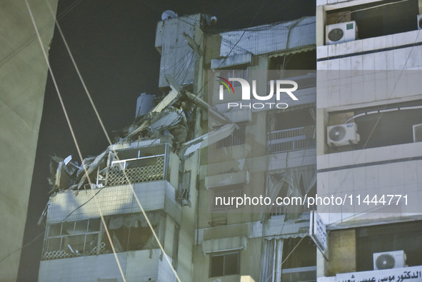 Ambulances are following an Israeli military strike on a building in Beirut's southern suburb, in Beirut, Lebanon, on July 30, 2024. The Isr...