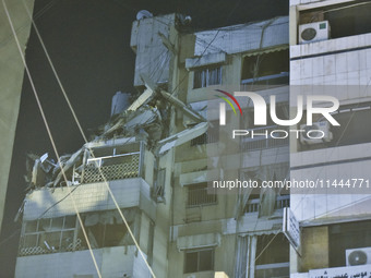 Ambulances are following an Israeli military strike on a building in Beirut's southern suburb, in Beirut, Lebanon, on July 30, 2024. The Isr...