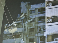 Ambulances are following an Israeli military strike on a building in Beirut's southern suburb, in Beirut, Lebanon, on July 30, 2024. The Isr...