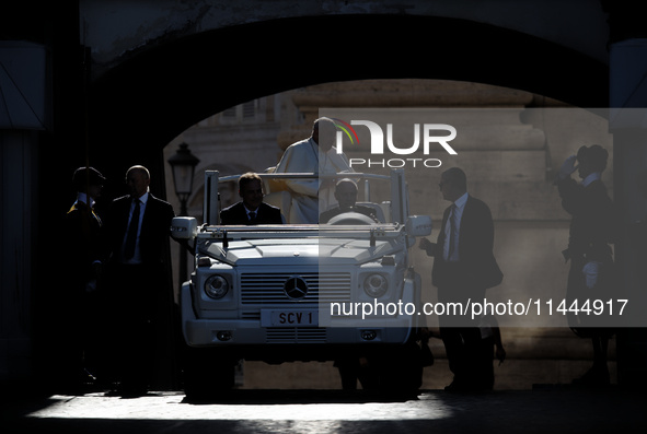 Pope Francis is arriving in St. Peter's Square to meet with priests and altar servers at the Vatican, on July 30, 2024. 