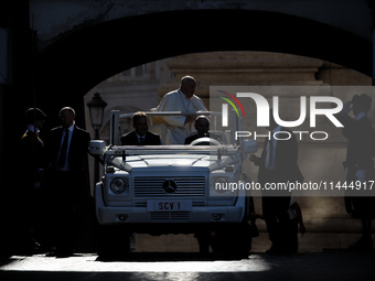 Pope Francis is arriving in St. Peter's Square to meet with priests and altar servers at the Vatican, on July 30, 2024. (