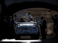 Pope Francis is arriving in St. Peter's Square to meet with priests and altar servers at the Vatican, on July 30, 2024. (