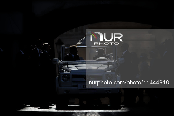 Pope Francis is arriving in St. Peter's Square to meet with priests and altar servers at the Vatican, on July 30, 2024. 