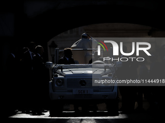 Pope Francis is arriving in St. Peter's Square to meet with priests and altar servers at the Vatican, on July 30, 2024. (