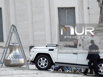 Pope Francis is arriving in St. Peter's Square to meet with priests and altar servers at the Vatican, on July 30, 2024. (