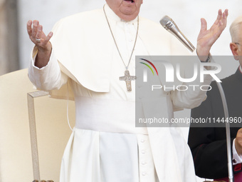 Pope Francis is gesturing during an open-air audience of the XIII International Pilgrimage of Altar Servers at St. Peter's Square in the Vat...