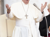 Pope Francis is gesturing during an open-air audience of the XIII International Pilgrimage of Altar Servers at St. Peter's Square in the Vat...