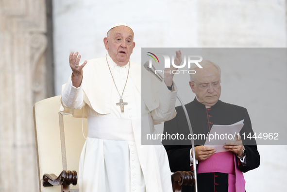 Pope Francis is gesturing during an open-air audience of the XIII International Pilgrimage of Altar Servers at St. Peter's Square in the Vat...