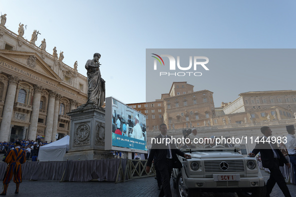 Pope Francis is arriving in St. Peter's Square to meet with priests and altar servers at the Vatican, on July 30, 2024. 