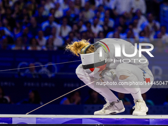 Auriane Mallo-Breton of Team France react after losing the Fencing Women's Epee Team Gold Medal match between Team France and Team Ital on d...