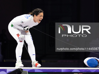 Alberta Santuccio of Team Italy celebrates winning the Fencing Women's Epee Team Gold Medal match between Team France and Team Ital on day f...