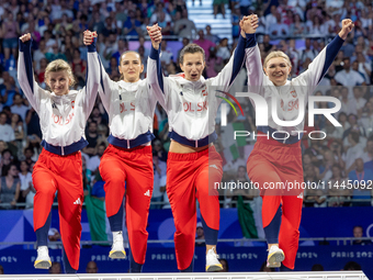 Bronze medalists Aleksandra Klasik,  Martyna Swatowska-Weglarczyk,Renata Knapik-Miazga and  Aleksandra Jarecka of Team Poland pose on the po...