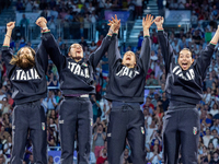 Gold medalists of Team Italy celebrate on the podium during the Fencing Women's Epee medal ceremony on day four of the Olympic Games Paris 2...