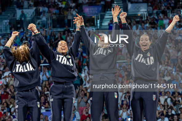 Gold medalists of Team Italy celebrate on the podium during the Fencing Women's Epee medal ceremony on day four of the Olympic Games Paris 2...