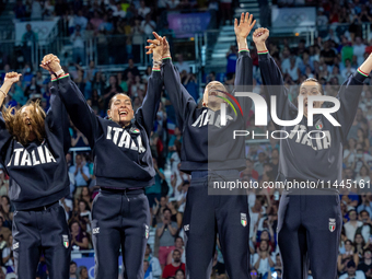 Gold medalists of Team Italy celebrate on the podium during the Fencing Women's Epee medal ceremony on day four of the Olympic Games Paris 2...