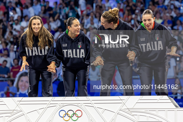 Gold medalists of Team Italy celebrate on the podium during the Fencing Women's Epee medal ceremony on day four of the Olympic Games Paris 2...