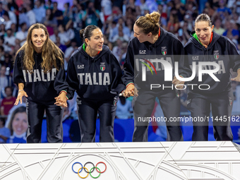 Gold medalists of Team Italy celebrate on the podium during the Fencing Women's Epee medal ceremony on day four of the Olympic Games Paris 2...