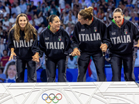 Gold medalists of Team Italy celebrate on the podium during the Fencing Women's Epee medal ceremony on day four of the Olympic Games Paris 2...