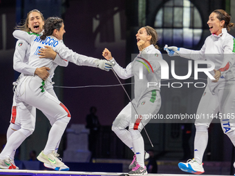  Team Italy celebrate victory during the Fencing Women's Epee Team Gold Medal match between Team France and Team Ital on day four of the Oly...