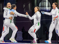  Team Italy celebrate victory during the Fencing Women's Epee Team Gold Medal match between Team France and Team Ital on day four of the Oly...